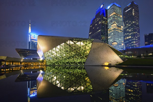 GUANGZHOU, CHINA, APRIL 27, 2018: Guangzhou Opera House designed by famous Iraqi architect architect Zaha Hadid illluminated at night