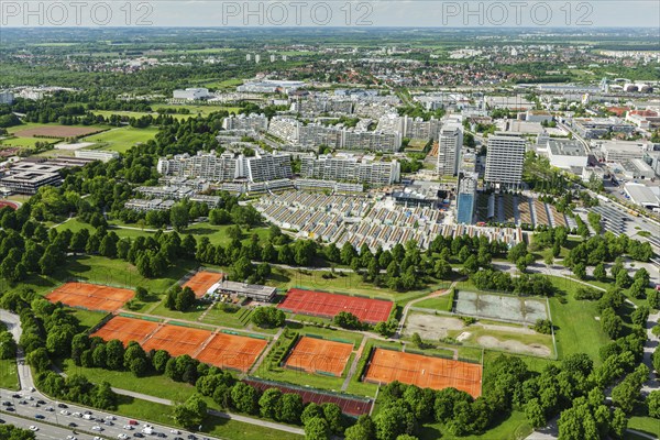 Aerial view of Munich Olympic village and tennis couts from Olympiaturm (Olympic Tower) . Munich, Bavaria, Germany, Europe