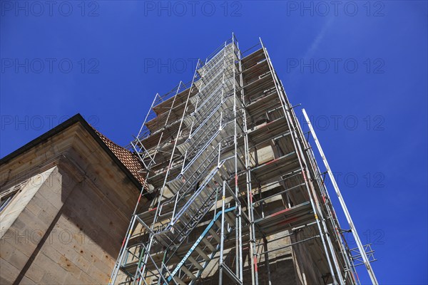 Rendered church tower, renovation, St. Bartholomew's Lutheran Parish Church, Germany's second smallest town, Ummerstadt in the district of Hildburghausen, Thuringia, Germany, Europe