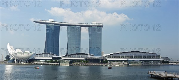 SINGAPORE, MAY 6: The Marina Bay Sands complex on May 6, 2011 in Singapore. Marina Bay Sands is an integrated resort and billed as the world's most expensive standalone casino property. Panorama image