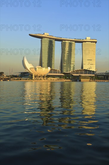 SINGAPORE, MAY 6: The Marina Bay Sands complex on sunset on May 6, 2011 in Singapore. Marina Bay Sands is an integrated resort and billed as the world's most expensive standalone casino property