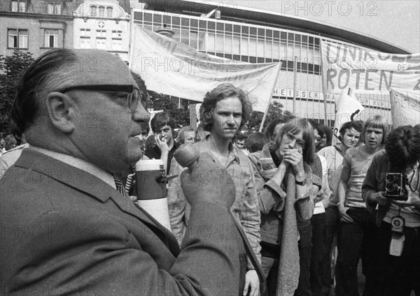 Student associations had called for this and students at Bonn University followed the call for a demonstration on 3 July 1971 against the war in Vietnam.Arno Behrisch at the microphone, Germany, Europe