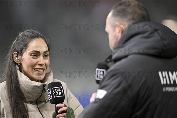 DAZN reporter presenter Ann-Sophie Kimmel, smiling, in interview microphone microphone logo Coach Frank Schmidt 1. FC Heidenheim 1846 FCH, Voith-Arena, Heidenheim, Baden-Württemberg, Germany, Europe