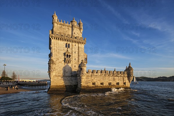 Belem Tower or Tower of St Vincent, famous tourist landmark of Lisboa and tourism attraction, on the bank of the Tagus River Tejo on sunset. Lisbon, Portugal, Europe