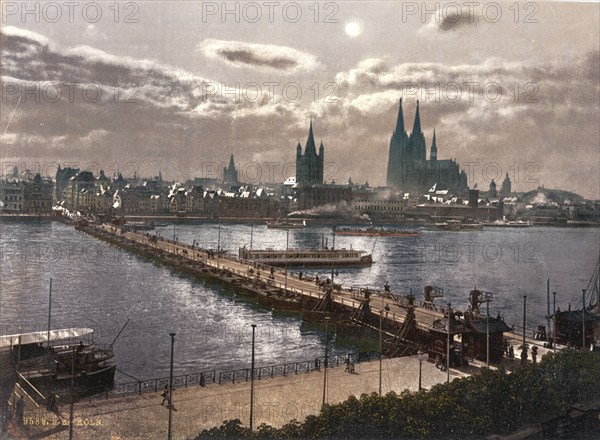 Cologne, Germany, 1890-1905, view of the city by moonlight across the Rhine with the cathedral on the right, Europe