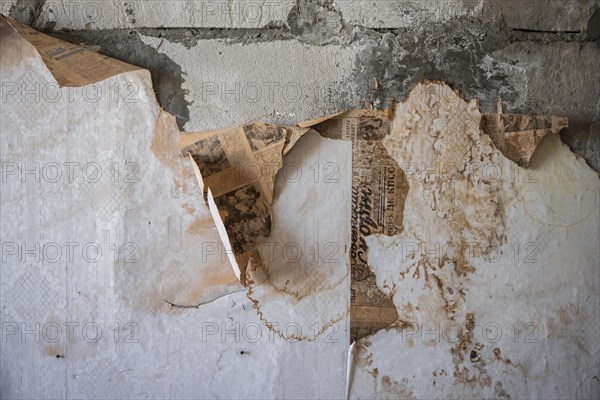 Peeling wallpaper, abandoned destroyed room in a residential building, Soviet apartment blocks, ghost town, Engilchek, Tian Shan, Kyrgyzstan, Asia