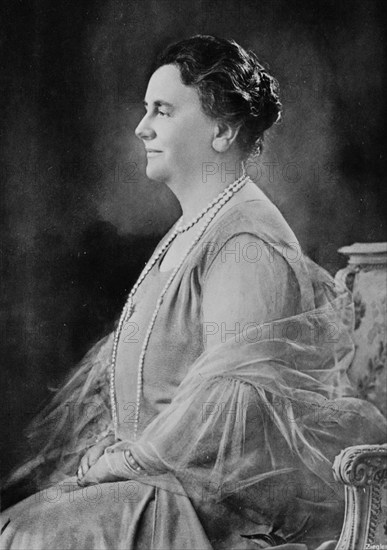 Wilhelmina (Wilhelmina Helena Pauline Maria: 1880-1962) Queen of the Kingdom of the Netherlands from 1890-1948. three-quarter profile portrait of the seated Queen Wilhelmina