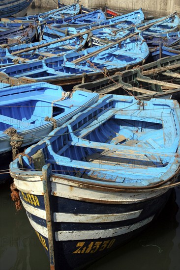 Traditional blue fishing boats in the harbour of Essaouira on the Moroccan Atlantic coast, Morocco, North Africa, Africa