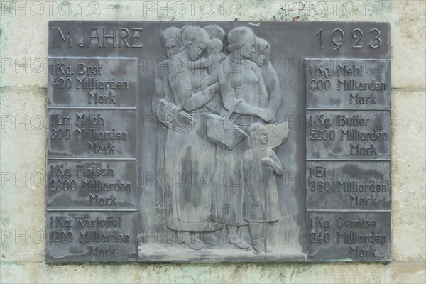 Relief at the war memorial with historical prices of food for inflation in 1923, historical, Weimar Republic, year, Rüsselsheim, Hesse, Germany, Europe