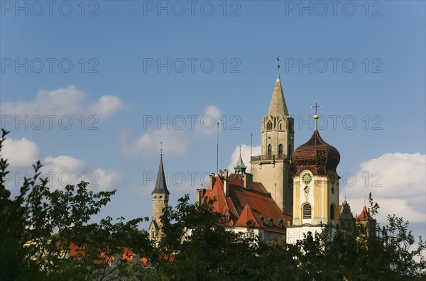 Hohenzollern Palace Sigmaringen, former princely residence and administrative seat of the Princes of Hohenzollern-Sigmaringen, town palace, architecture, historical building, on the right Roman Catholic parish church of St John, St John the Evangelist, baroque hall church, church, west view, Sigmaringen, Upper Swabia, Baden-Württemberg, Germany, Europe