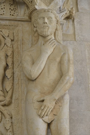 Adam with a fig leaf on the western gate of Trogir Cathedral or Cathedral of St. Lawrence, 13th century, by the artist Radovan, historic centre, Unesco World Heritage Site, Trogir, Dalmatia, Croatia, Europe