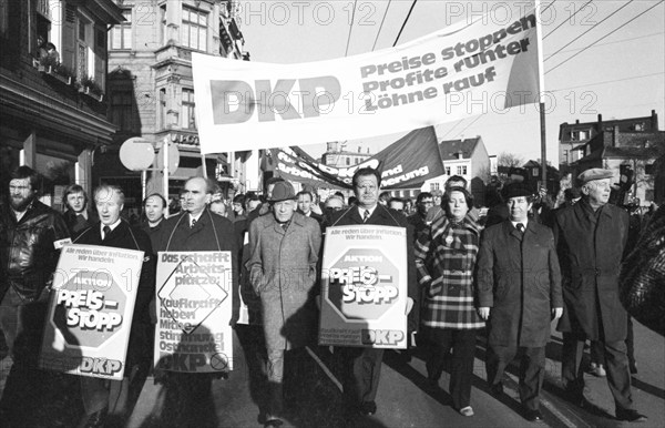 Supporters and functionaries of the DKP demonstrated for a price freeze of communal and general prices on 18.01.1975 in Solingen.Kurt Bachmann 3rd from left, Max Reimann 4th from left, Herbert Mies 5th from left, Hermann Gauthier 7th from left, Germany, Europe