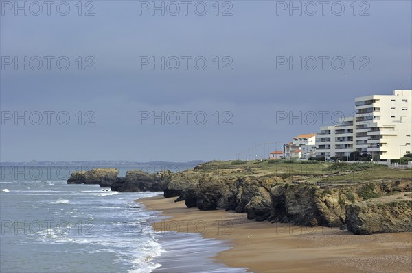 Apartments and rocky coastline at Saint-Hilaire-de-Riez, La Vendée, Pays de la Loire, France, Europe