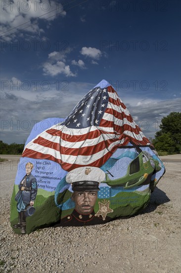 Menlo, Iowa, The Freedom Rock, painted by Ray Bubba Sorensen II to honor American military veterans. The artist is a Republican member of the Iowa House of Representatives