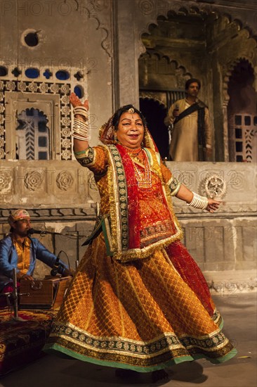 UDAIPUR, INDIA, NOVEMBER 24: Bhavai performance, famous folk dance of Rajasthan state of India. Performer balances number of earthen pots as she dance. November 24, 2012 in Udaipur, Rajasthan, India, Asia