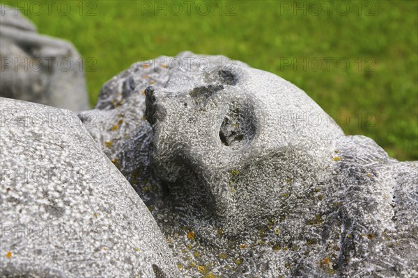 The Swedish grave, former mass grave of 300 Swedish cavalry soldiers, memorial, memorial stone, burial ground, place of worship, monument, replica of bones, human skeleton, skull bone, stone sculpture, sculpture, Mühlheim an der Donau, Baden-Württemberg, Germany, Europe