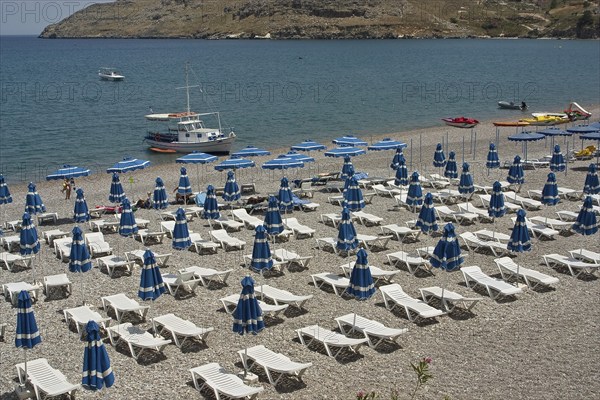 Rhodes Island, Lindos, Lindos is a town on the Greek island of Rhodes. Its landmark is the acropolis on a rock with huge archways from the 4th century and reliefs dating from around 280 BC