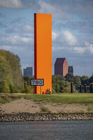 The sculpture Rhine Orange at the mouth of the Ruhr into the Rhine, skyline of the city centre of Duisburg, tower of the North Rhine-Westphalia State Archive, town hall tower and Salvator Church, North Rhine-Westphalia, Germany, Europe