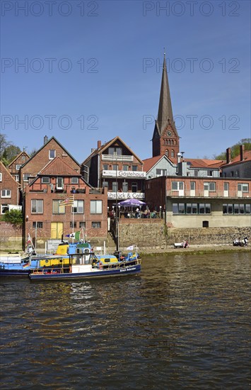 Europe, Germany, Schleswig-Holstein, Hamburg Metropolitan Region, Lauenburg, Elbe, View from the paddle steamer Kaiser Wilhelm onto the Elbe promenade with Maria Magdalen Church, Hamburg, Hamburg, Federal Republic of Germany, Europe