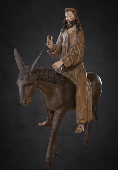 Palm tree donkey, wooden figure from 1470, on a dark background, Franciscan Museum, Villingen, Baden-Württemberg, Germany, Europe