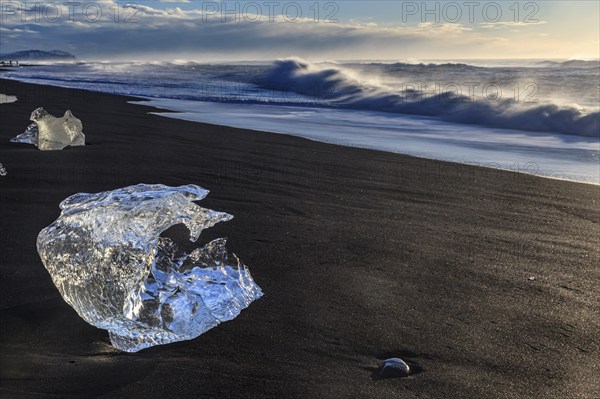 Ice floes on the beach, waves, sunny, morning mood, winter, Diamond Beach, Breidamerkursandur, Jökulsarlon, Iceland, Europe