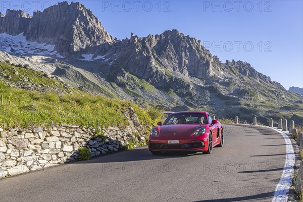 Furka Pass. Early in the morning, when the roads are still clear, the time for speeders and sports cars to take a quick lap over the Alpine pass begins. Realp, Canton Uri, Switzerland, Europe