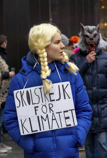 Rose Monday parade in Düsseldorf, street carnival, young man dressed as Greta Thunberg, Fridays for Future movement