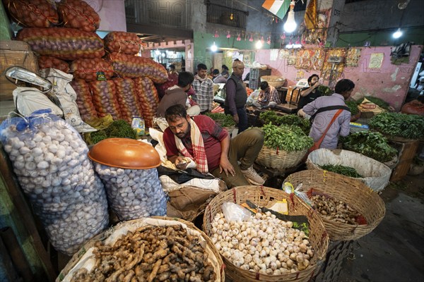 Vendor selling vegetables at a market, ahead of the presentation of the Interim Budget 2024 by Union Finance Minister Nirmala Sitharaman, in Guwahati, Assam, India on Thursday, Feb. 1, 2024