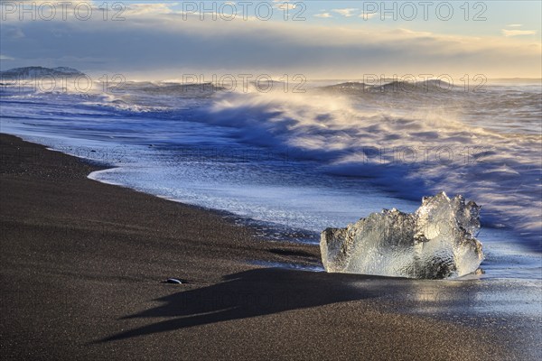 Ice floes on the beach, waves, sunny, morning mood, winter, Diamond Beach, Breidamerkursandur, Jökulsarlon, Iceland, Europe