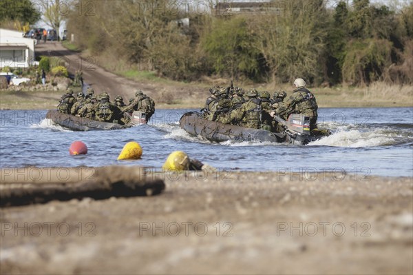 Czech soldiers cross the Elbe in an inflatable boat as part of the military exercise 'Wettiner Schwert' near Tangermünde, 26.03.2024. 'Wettiner Schwert' is part of the Quadriga exercise of the German Armed Forces and the NATO large-scale manoeuvre Steadtfast Defender 2024