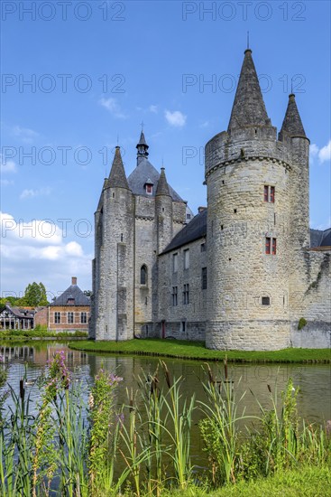 Round tower and keep of the Kasteel van Laarne, 14th century medieval moated castle near Ghent, East Flanders, Belgium, Europe