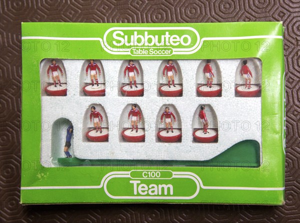 Boxed set of Subbuteo table soccer team C100 players close up, UK