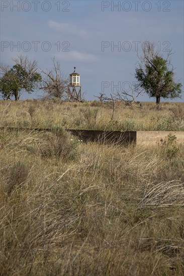 Granada, Colorado, The World War II Amache Japanese internment camp in southeast Colorado. More than 7, 000 Japanese and Japanese-Americans were held at the site, one of 10 internment camps in the American west. Though all the buildings were demolished after the war, many foundations remain. A guard tower has been reconstructed