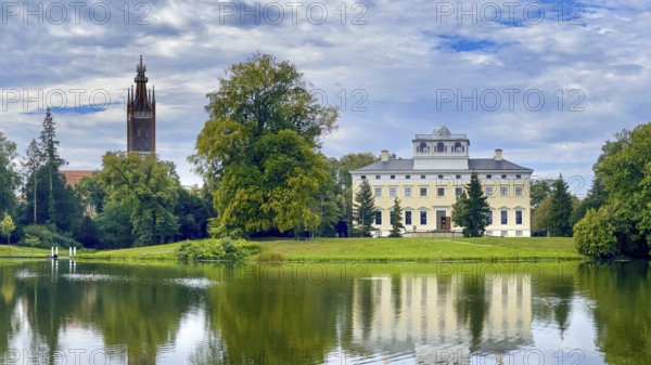 Wörlitz Park with a view of Wörlitz Palace, church, Dessau-Wörlitz Garden Kingdom, Unesco World Heritage Site, summer feeling, holiday destination, sunshine, Prince Friedrich Franz von Anhalt-Dessau, Dessau-Wörlitz Cultural Foundation, Middle Elbe Biosphere Reserve, Saxony-Anhalt, Germany, Europe