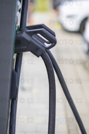 Electric cars at charging stations, Dresden, Saxony, Germany, Europe