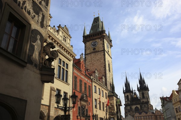 The historic Old Town Hall with the Gothic tower and the towers of the Teyn Church on the Old Town Square, Prague, Czech Republic, Europe