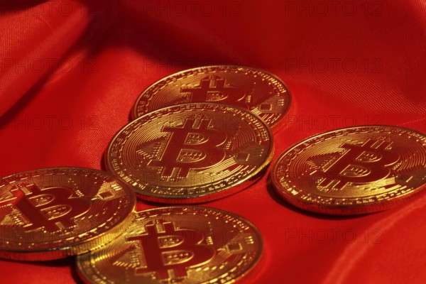 Close-up of symbolic bitcoins