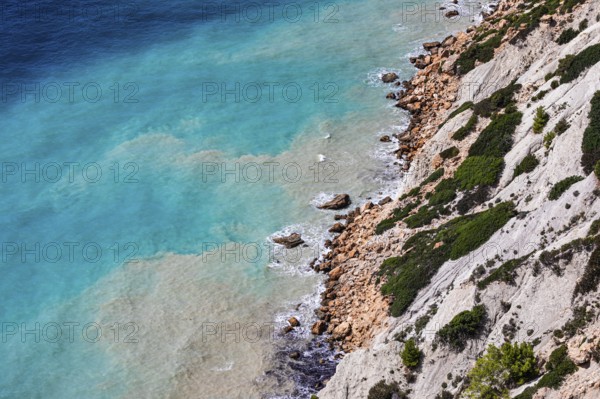 Steep coastline and turquoise-coloured water at Cap Blanc, Ibiza, Balearic Islands, Mediterranean, Spain, Europe