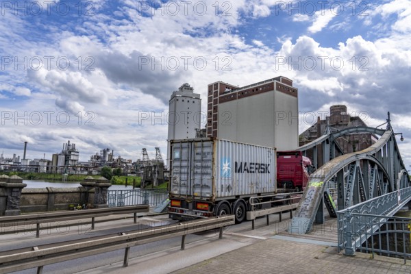 Rhine harbour Krefeld, inland port, 4th largest public port in North Rhine-Westphalia, trimodal handling of goods, goods, containers, general cargo, swing bridge over the harbour basin, North Rhine-Westphalia, Germany, Europe