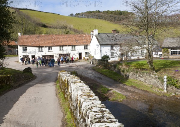 Groups of people outside Lorna Doone Farm, Malmsmead, Exmoor national park, Devon, England, United Kingdom, Europe