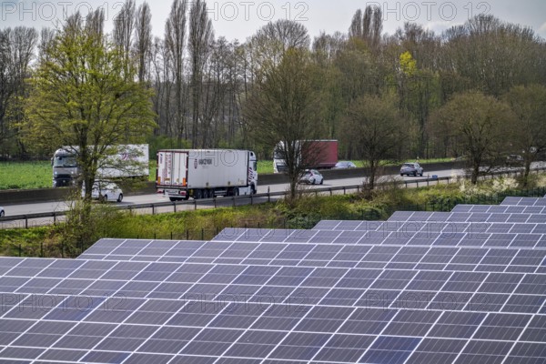 Solar park near Neukirchen-Vluyn, along the A40 motorway, over 10, 000 solar modules spread over 4.2 hectares, generating 6 million kilowatt hours per year, North Rhine-Westphalia, Germany, Europe