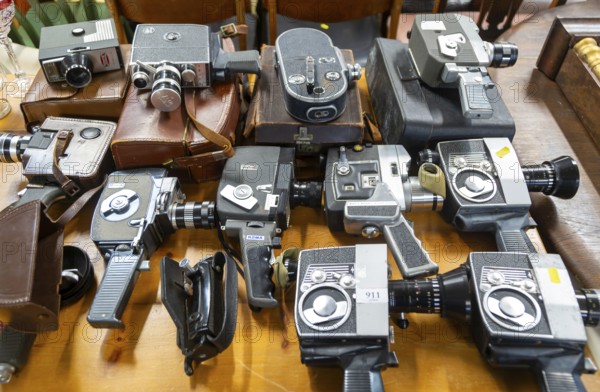 A collection of vintage cine film cameras on display at auction, UK