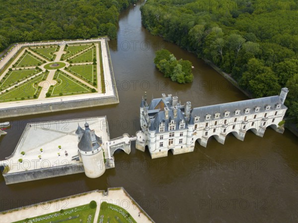 Historic castle with a Renaissance garden by a river and surrounded by dense forest, aerial view, Chenonceau Castle, Château de Chenonceau, moated castle, Chenonceaux, Cher River, France, Europe