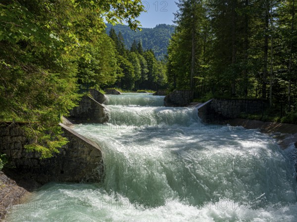 Small waterfall from the Rißbachstollem on Lake Walchensee, Bavaria, Germany, Europe