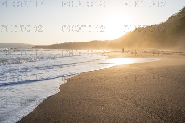 Sandy beach beach and sea at sunset, Playa Cocalito, coastal landscape, Pacific coast, Nicoya Peninsula, Puntarenas Province, Costa Rica, Central America