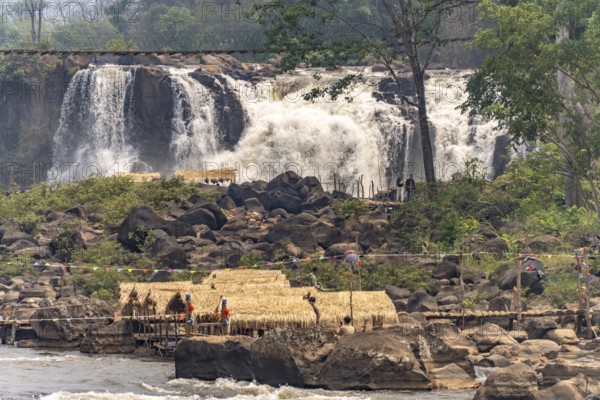 Huts at the Tad Lo waterfall in the Bolaven Plateau near Ban Saenvang, Laos, Asia