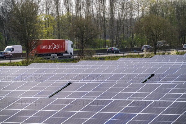 Solar park near Neukirchen-Vluyn, along the A40 motorway, over 10, 000 solar modules spread over 4.2 hectares, generating 6 million kilowatt hours per year, North Rhine-Westphalia, Germany, Europe