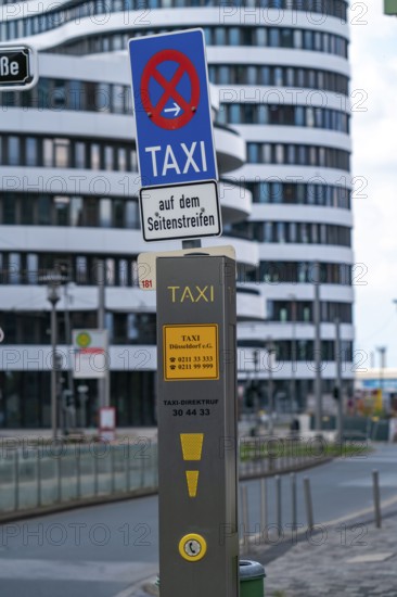 Taxi stop, call pillar, modern office building in the Media Harbour on the Rhine, Düsseldorf, North Rhine-Westphalia, Germany, Europe