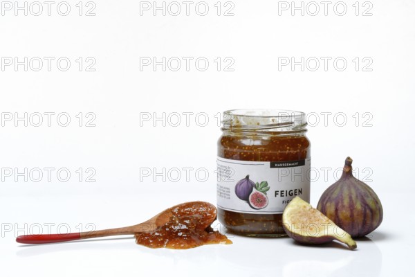 Fig jam in a jar and spoon with fig jam, fresh figs, Ficus carica