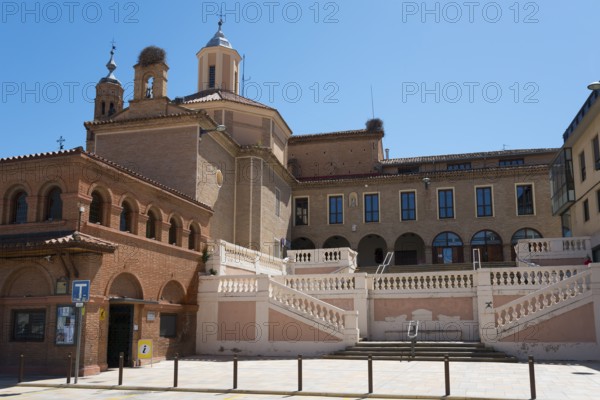 Historic church with stairs and brick façade under a blue sky, Iglesia y ex-convento de San Francisco, Church and former convent of San Francisco, Tarazona, Zaragoza, Aragon, Spain, Europe